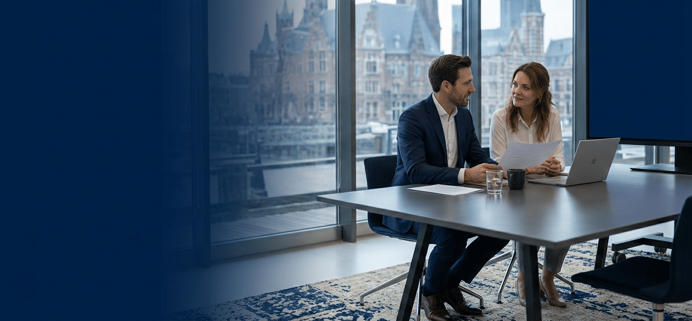 Premium hero banner for professional business services. Caucasian executive coach or business advisor in business attire having a one-on-one coaching session with a client in a b